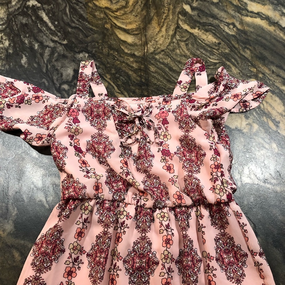 This dress is pink overload and nice for events!